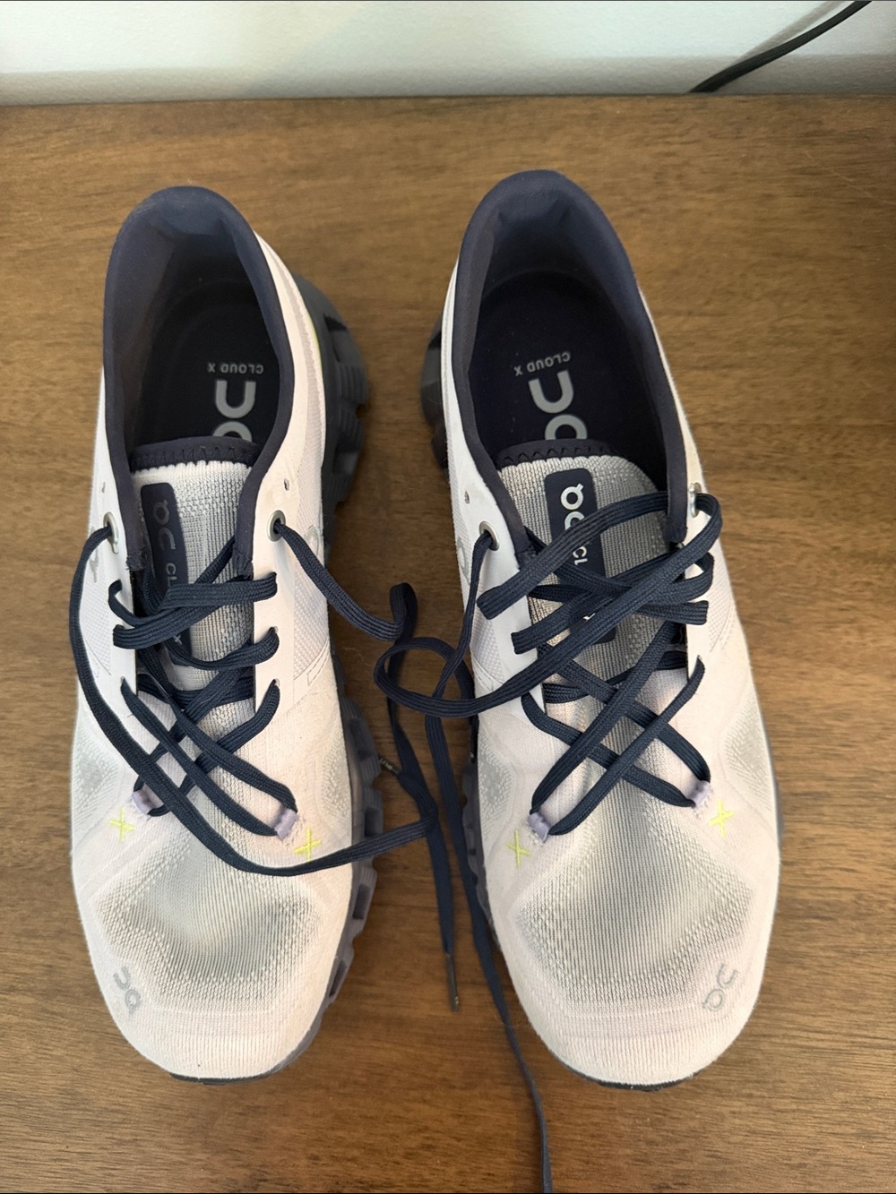 On Running Women's Athletic Shoes in White and Navy